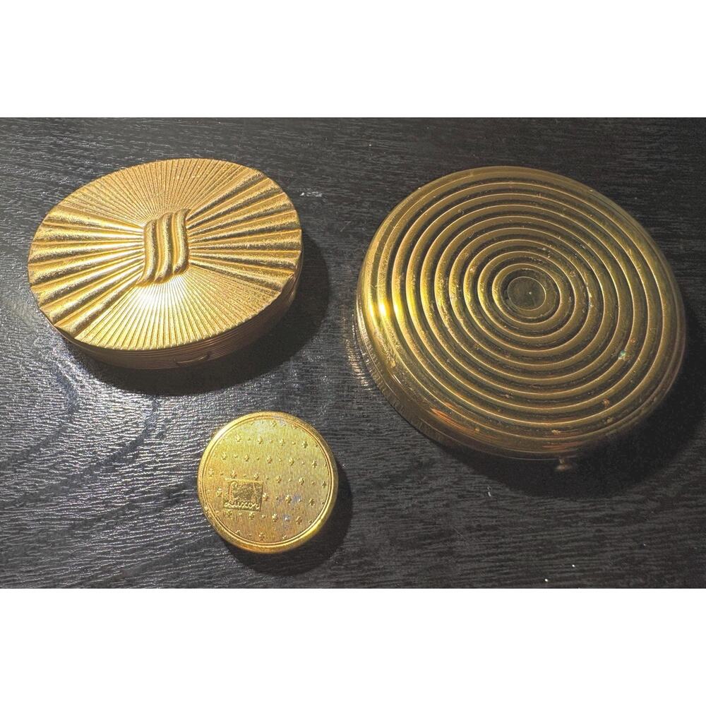 Vintage VTG Three metal gold-tone compacts from Dorset Fifth Ave, Luxor, and Eva